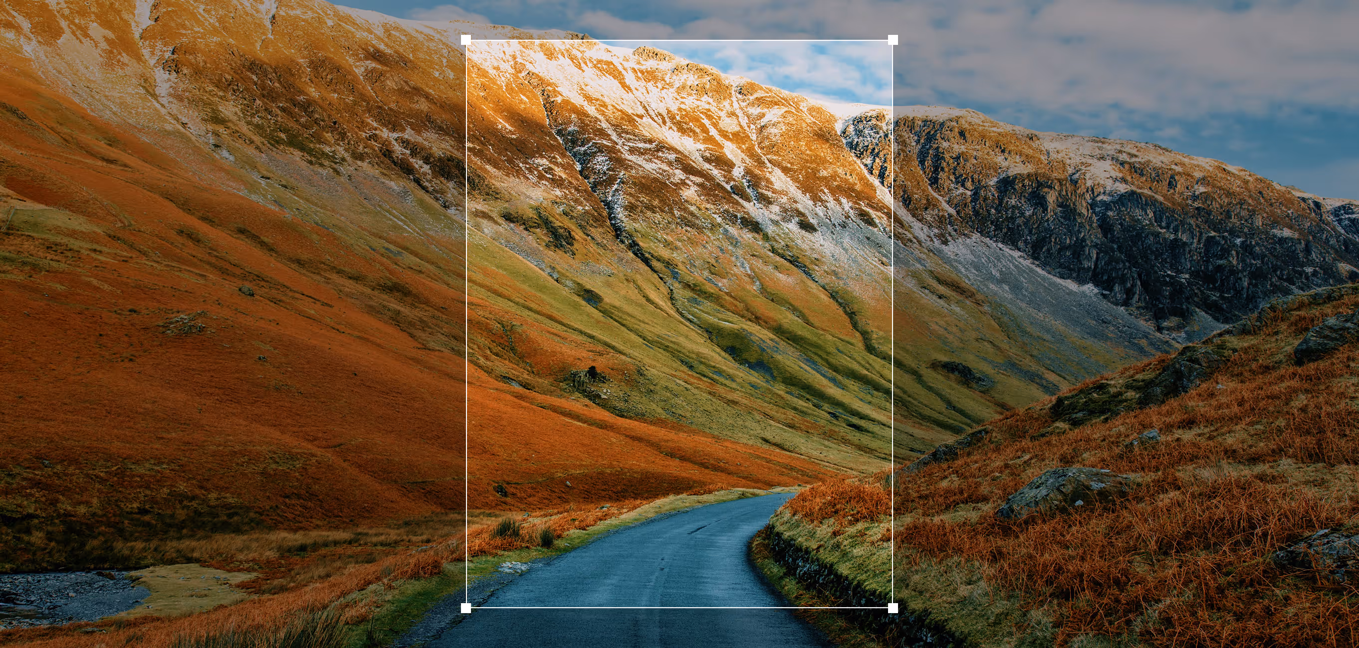 Image cropper UI over landscape with road photo