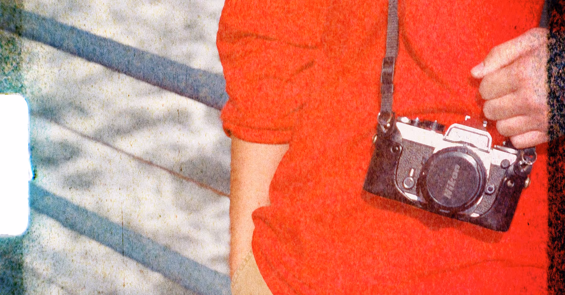 8mm 5 film border added to image of photographer with a camera around neck