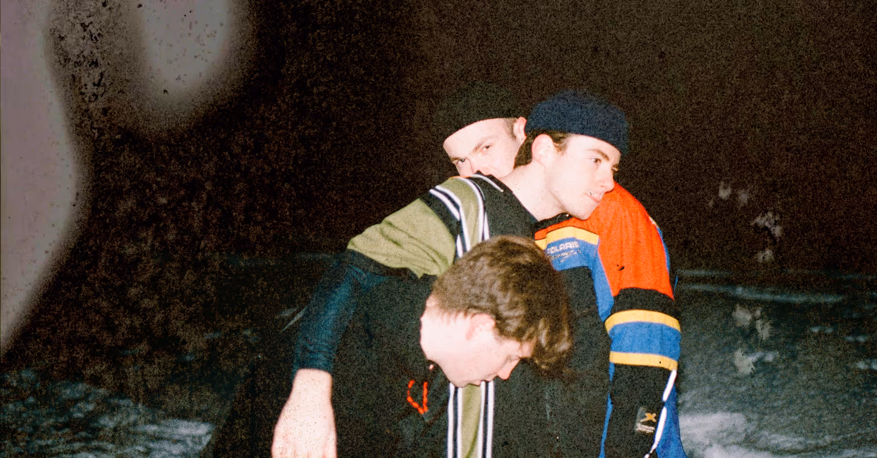 Distressed texture on photo of 3 friends