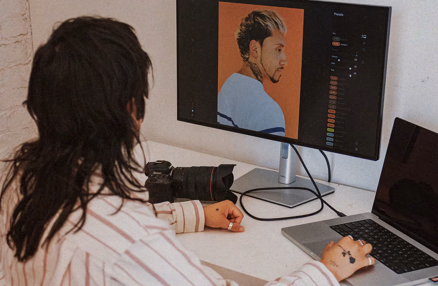 Photographer editing with VSCO Web Studio