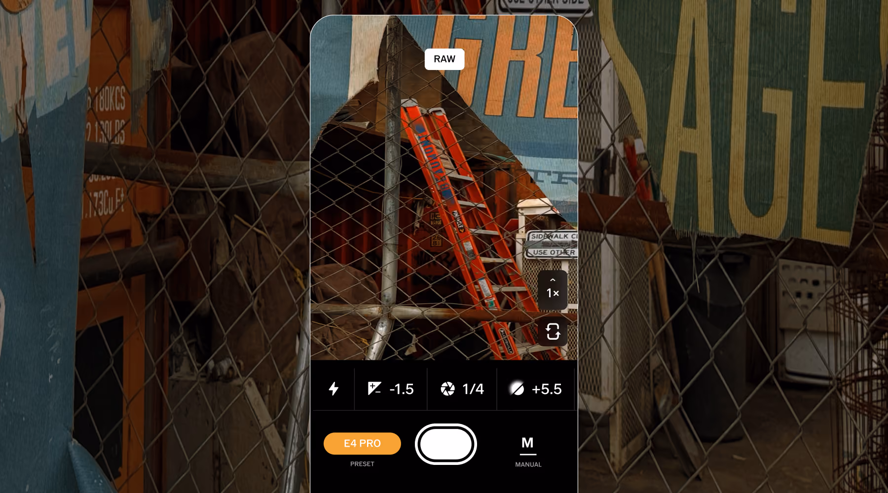 Screen showing VSCO camera app with live filter E4 PRO applied and manual settings capturing an orange ladder behind a chain-link fence in RAW format.