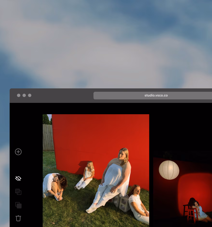 Online web editor showing images of four people in white clothing seated or crouched on grass against a bright red wall under daylight.