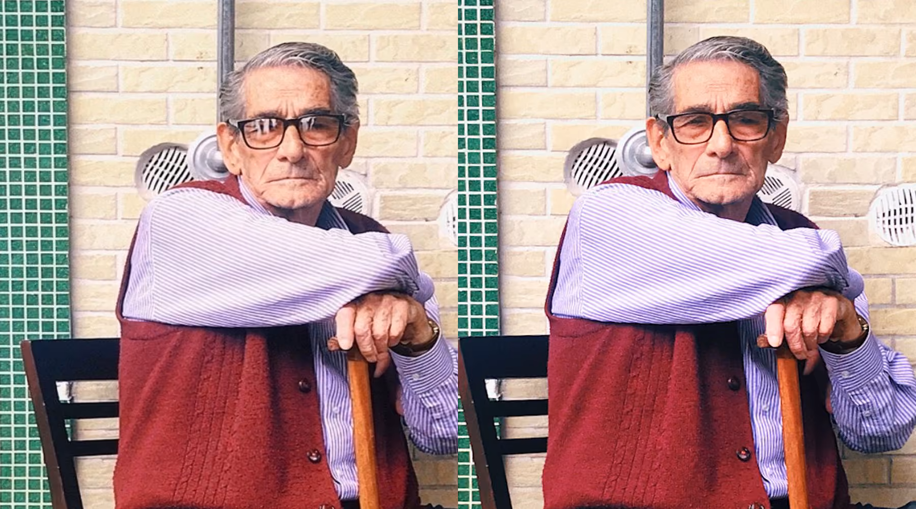 Side-by-side images of an elderly man sitting on a bench against a light brick wall with green tiled edges, wearing glasses, a maroon vest over a striped shirt, holding a wooden cane with both hands resting on top. Glasses glare removed from image on the right using AI prompt.