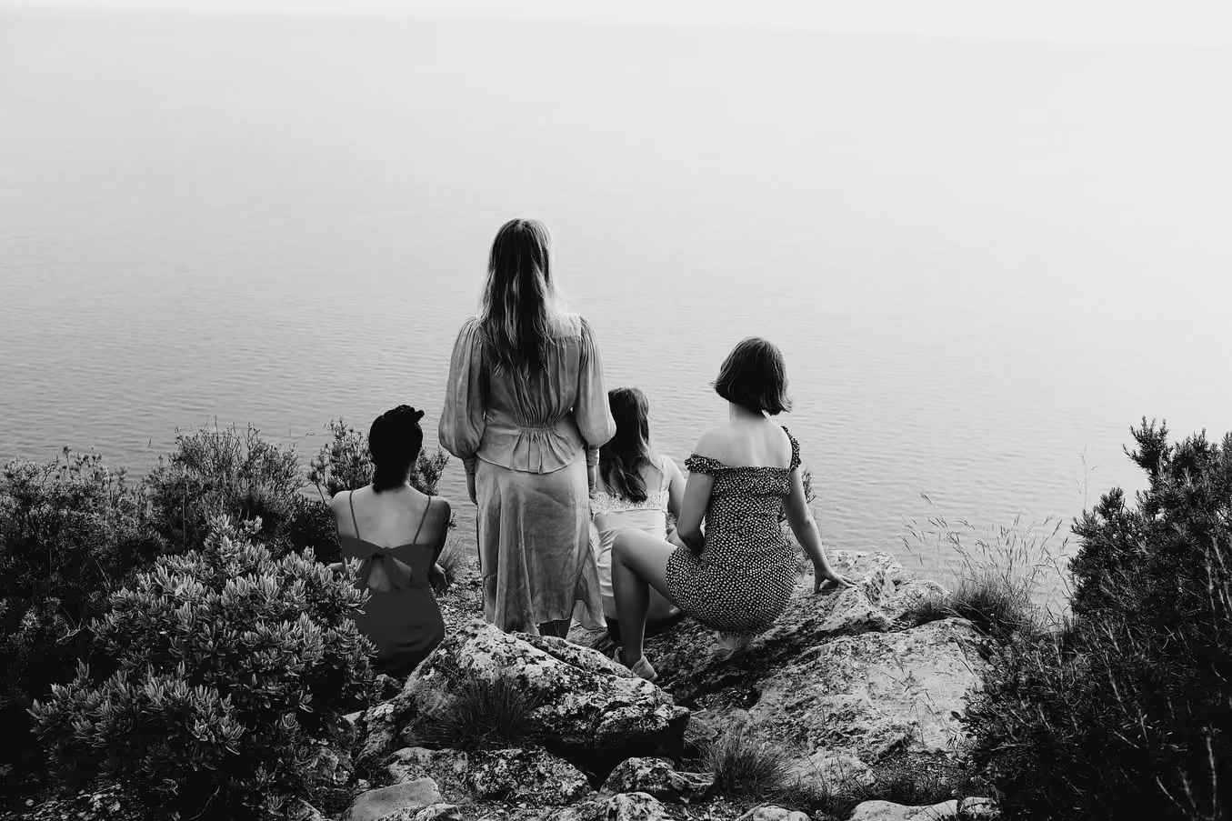 Four people on a clifftop above the sea, B5 PRO preset applied
