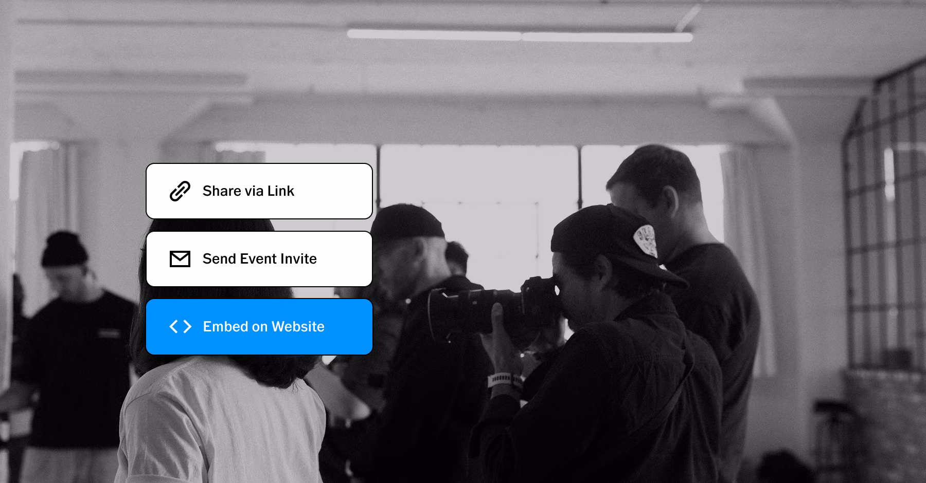 Photographers working in a studio with buttons for Share via Link, Send Event Invite, and Embed on Website.
