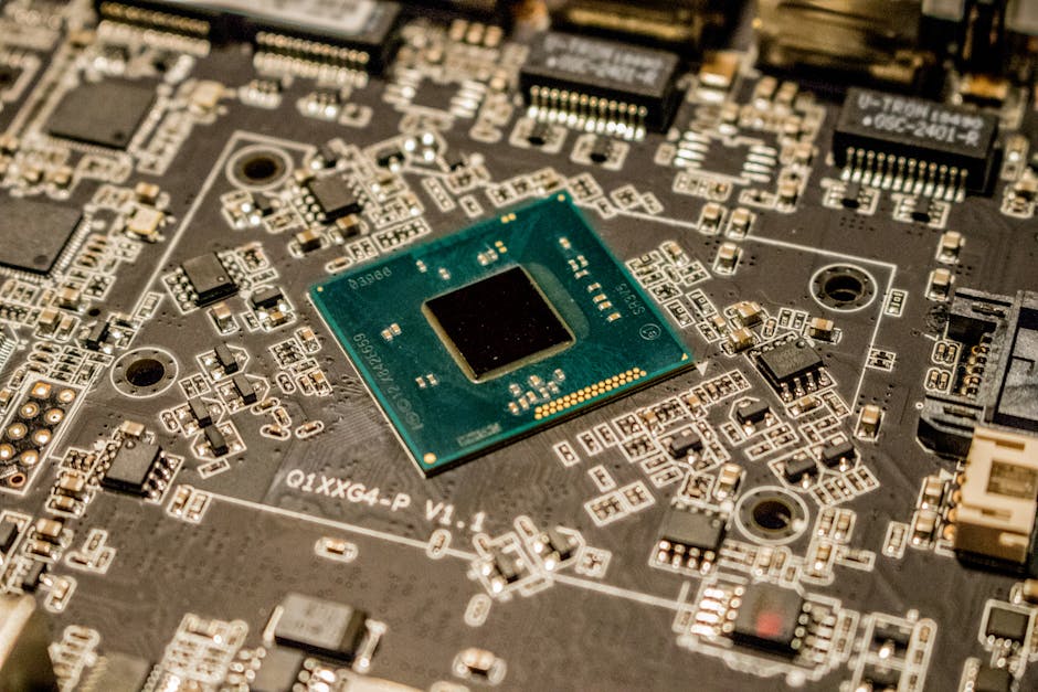 Detailed view of a microchip on a printed circuit board, showcasing electronic components.
