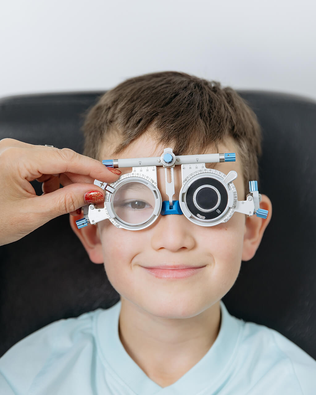 Child being fitted with daily myopia-control contact lenses at Rose Optometry, Hamilton