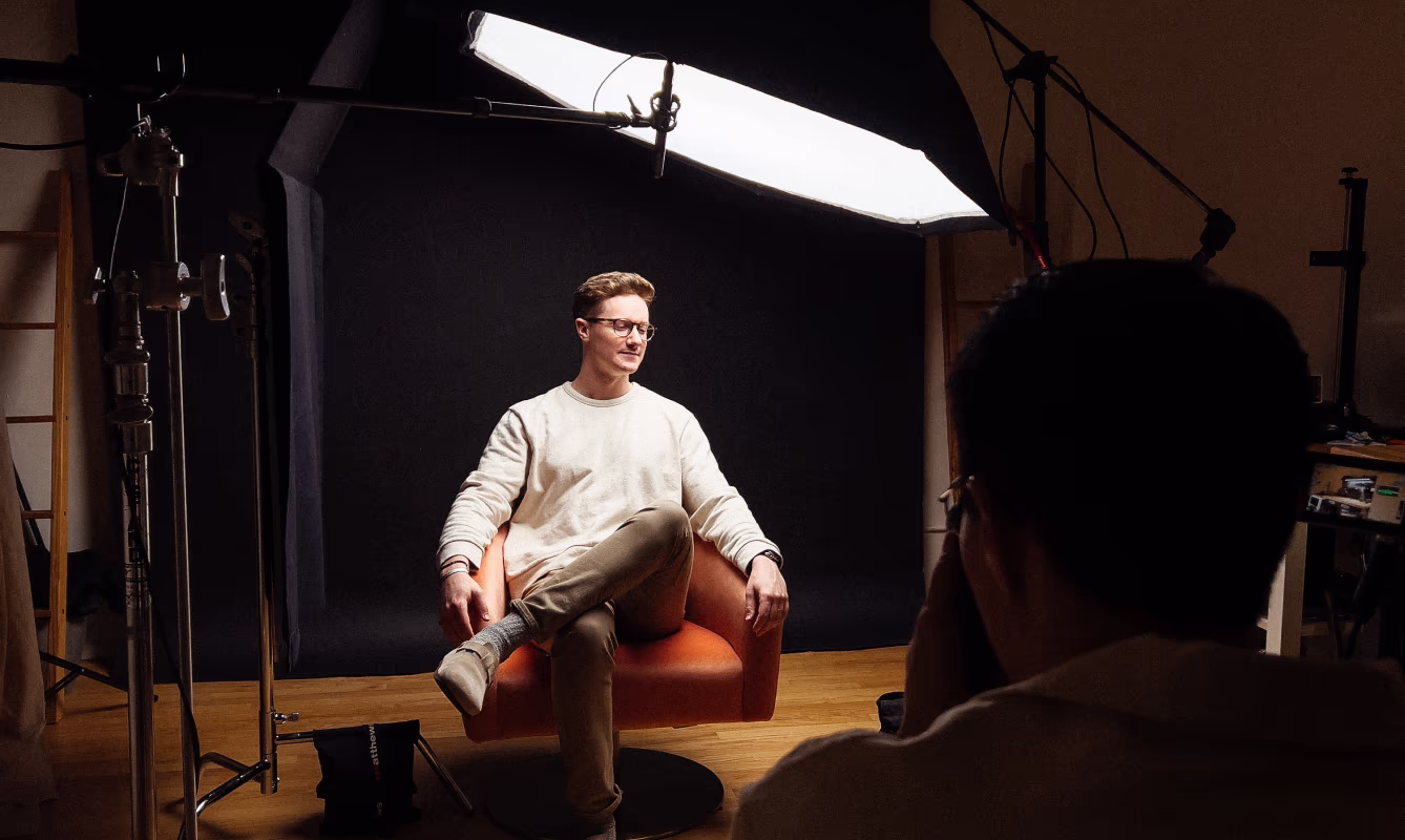 Professional photographer at work in studio set