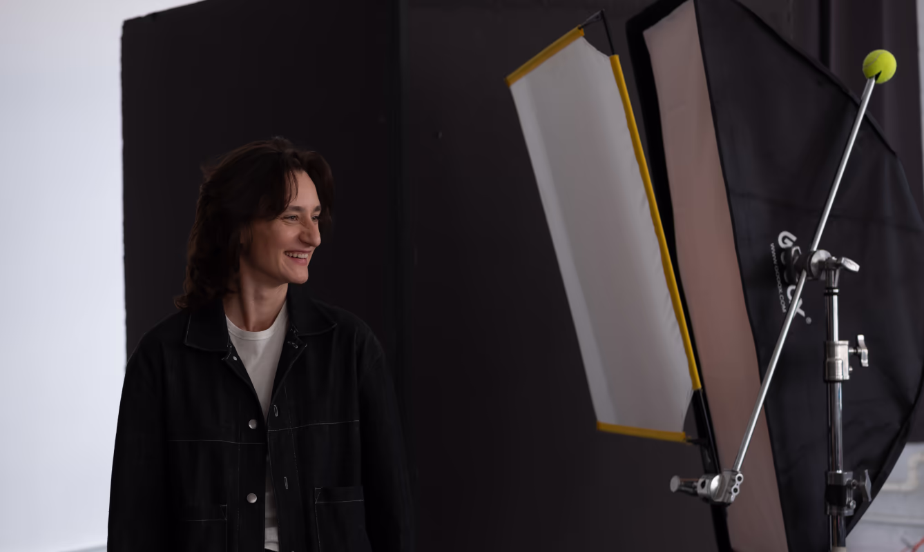 Smiling person during a professional photography photoshootg