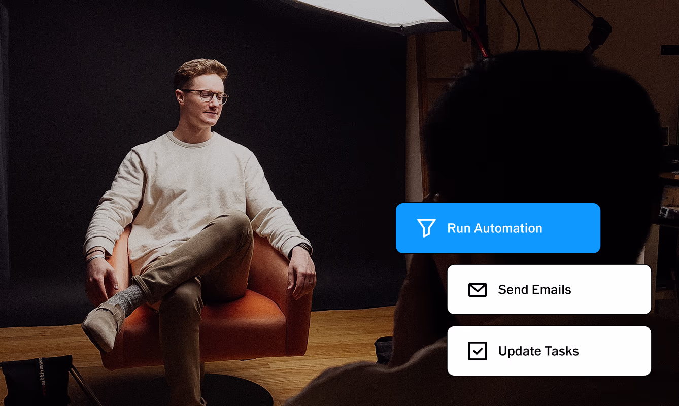 CRM options for Run Automation, Send Emails, Update Tasks overlaid on studio photoshoot image