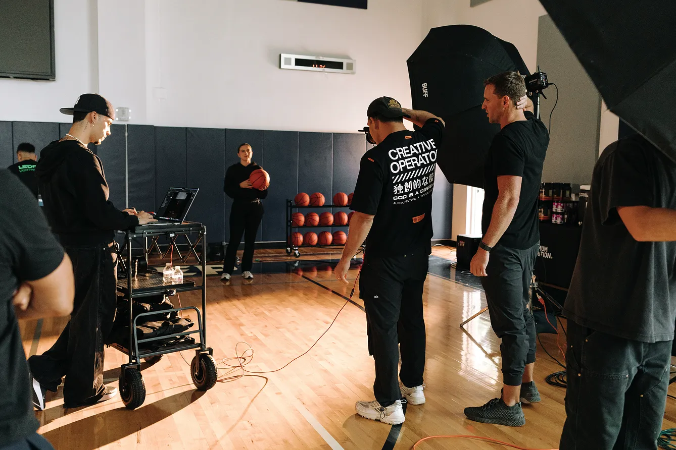 Photographer coordinating photoshoot crew