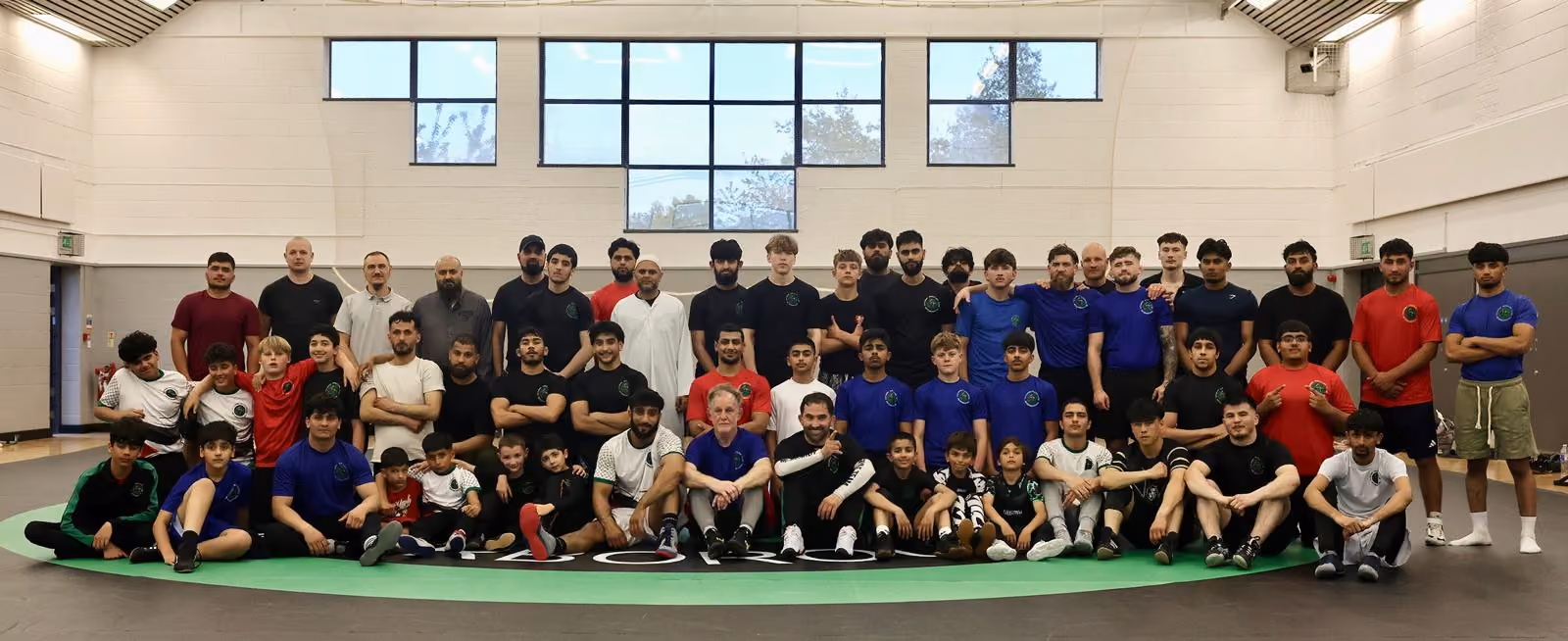Futuwwa Wrestling Club Peterborough group photo taken at Gladstone Park Community Centre 