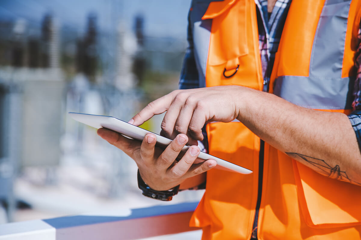 image of hands using tablet.