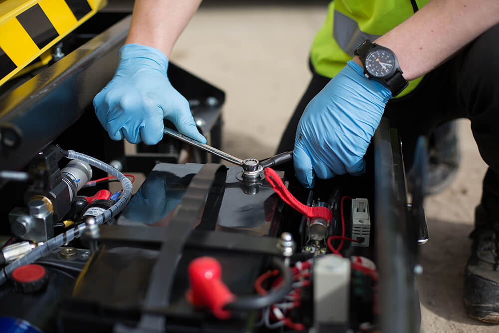 person working on equipment.