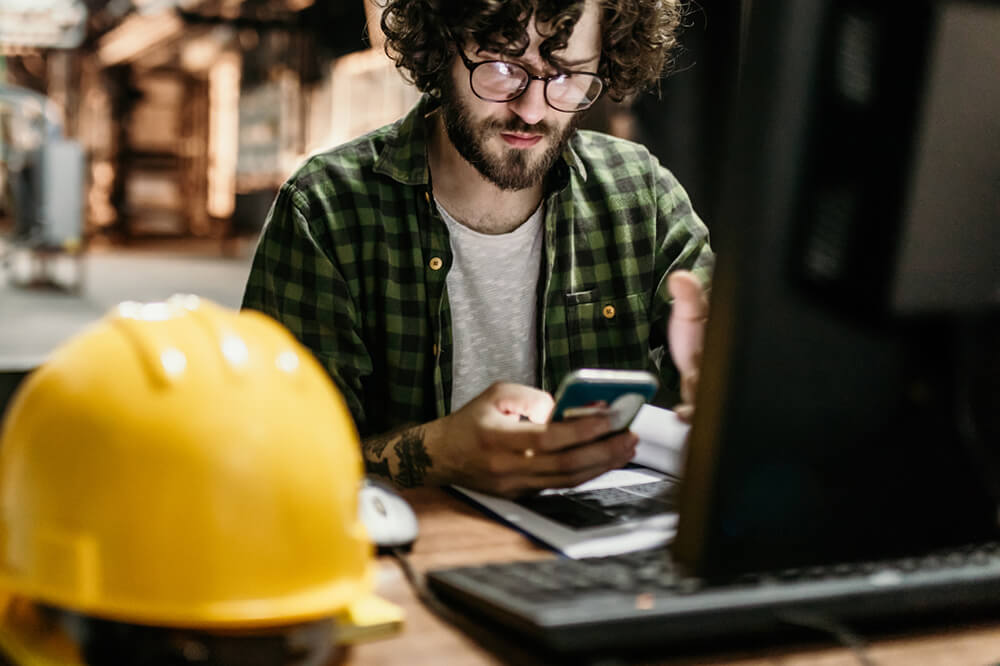 man working with electronics.