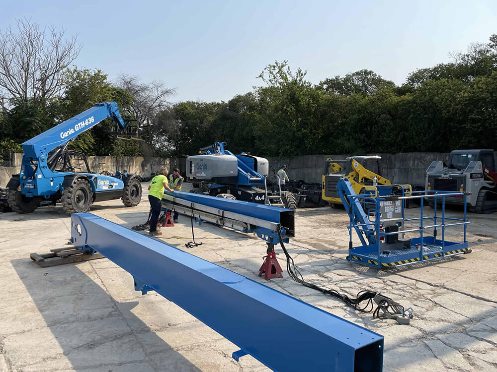 people working with Genie Equipment.