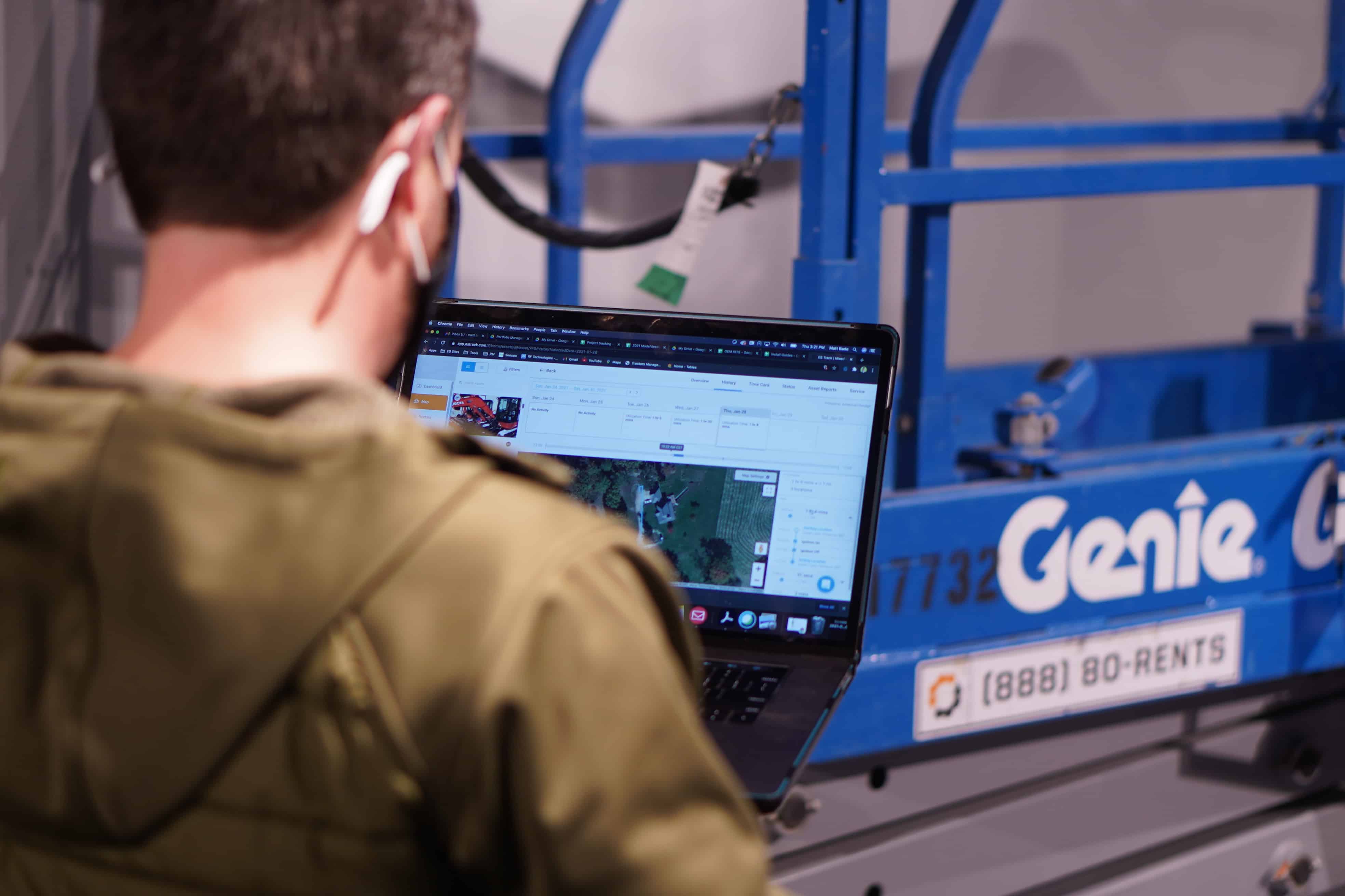 Man working on laptop.