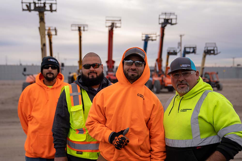 construction crew wearing high visibility clothes. 