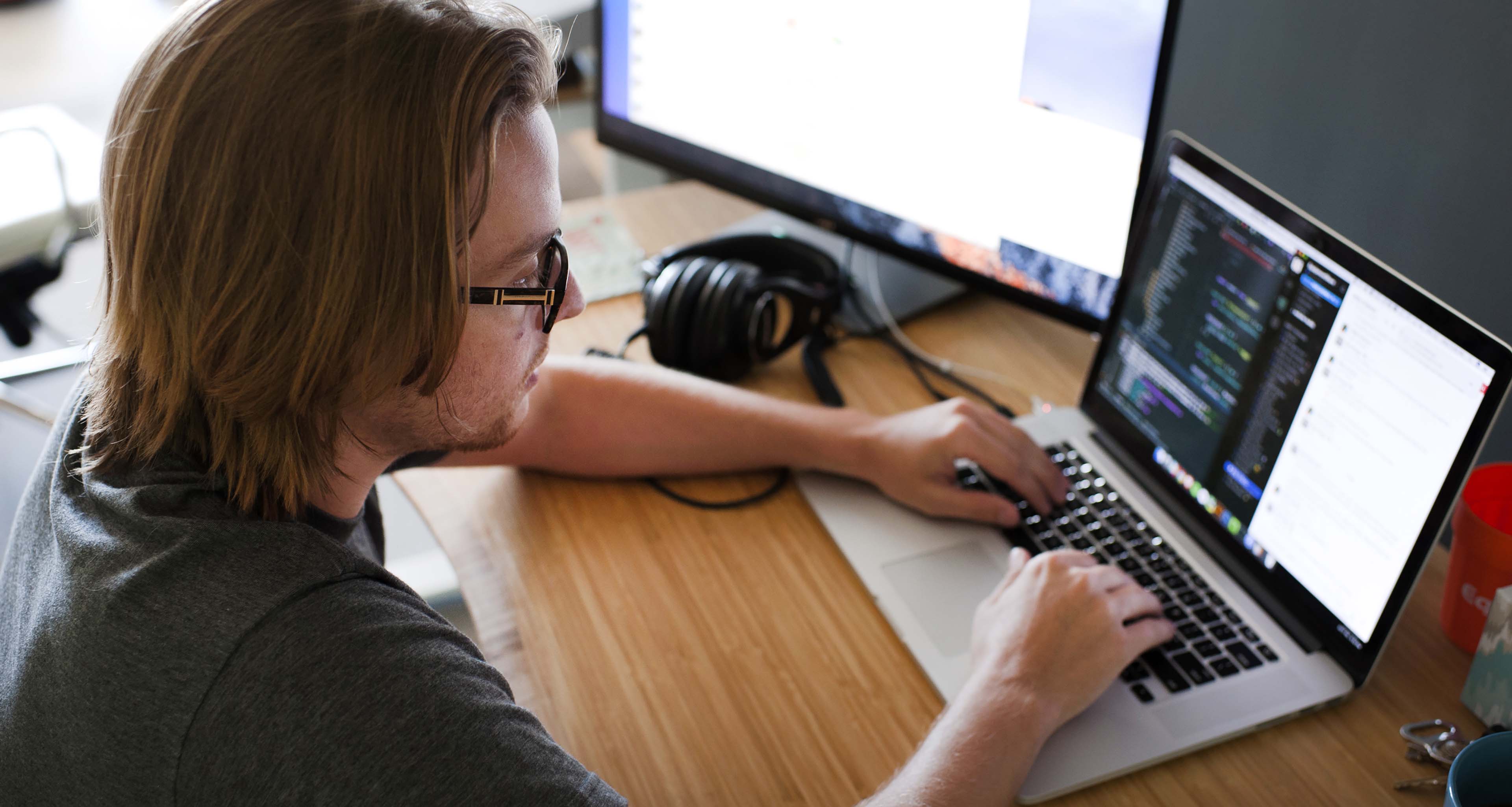 man working on a computer.