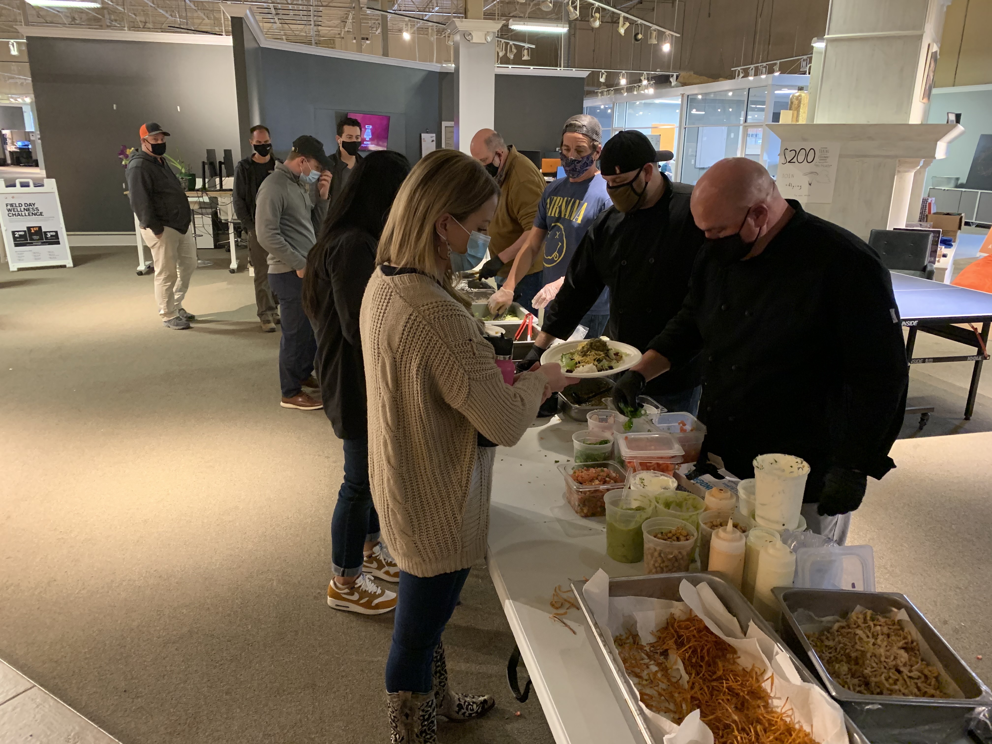 Employees enjoy a taco bar for lunch on Employee Appreciation Day