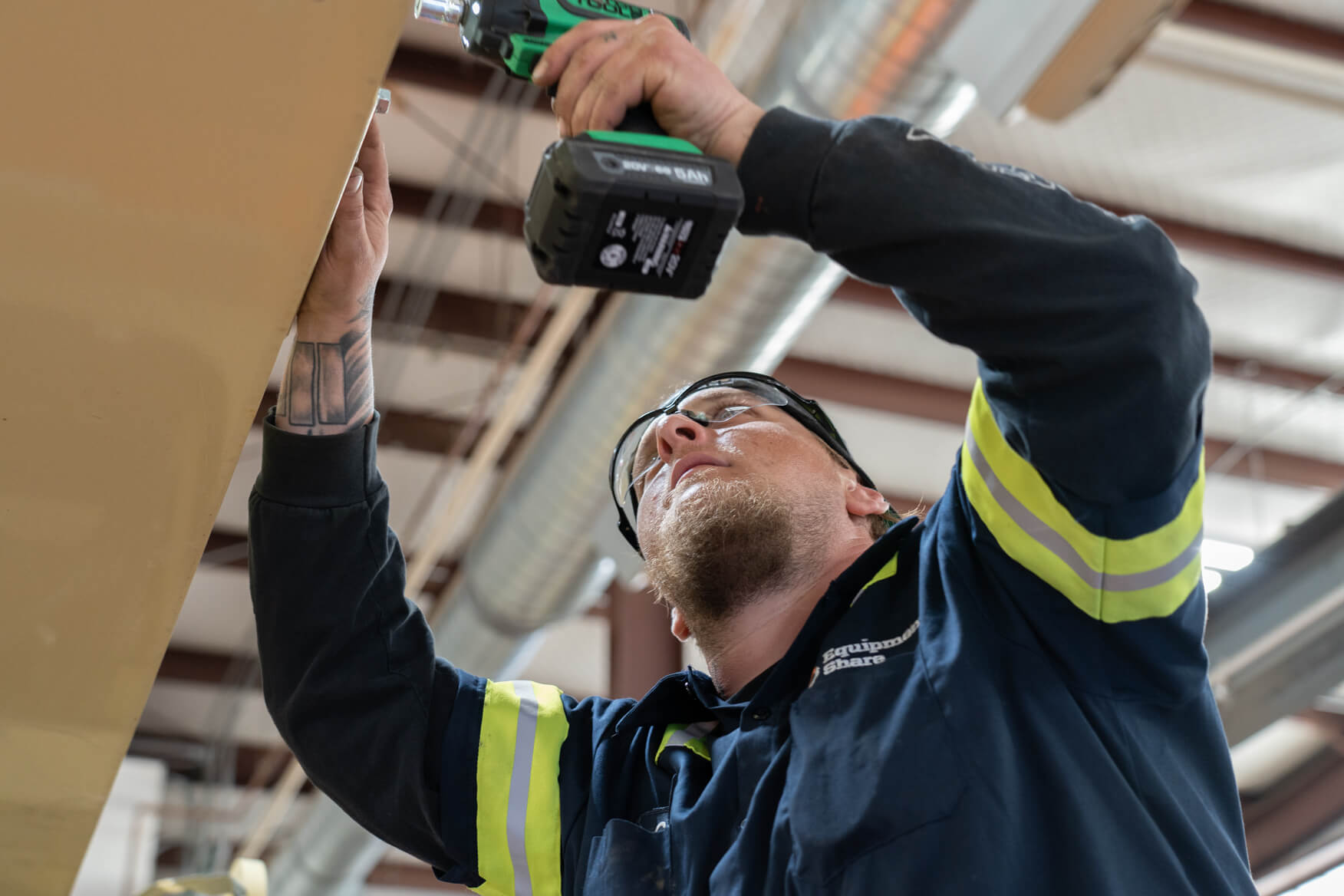 Technician working on equipment.