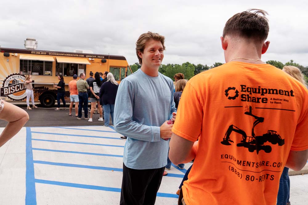 EquipmentShare employees waiting by a food truck