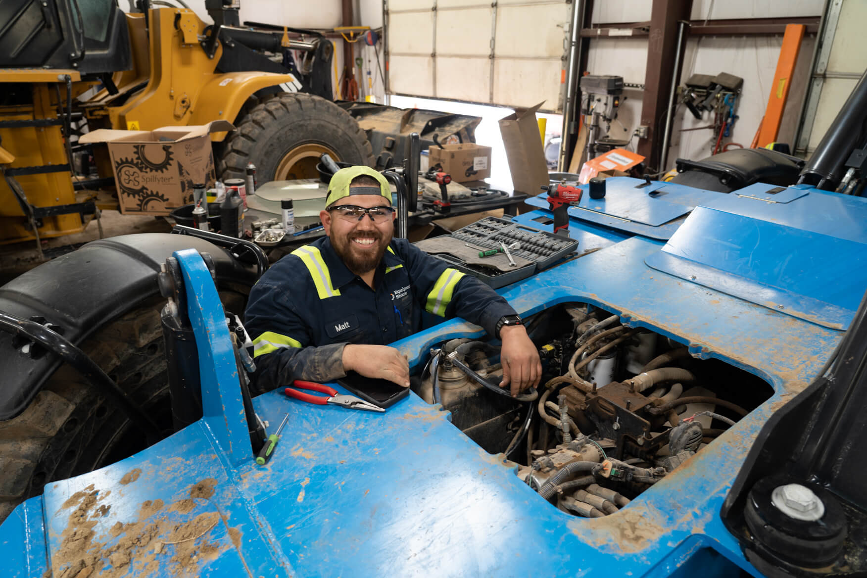 Man working on heavy equipment