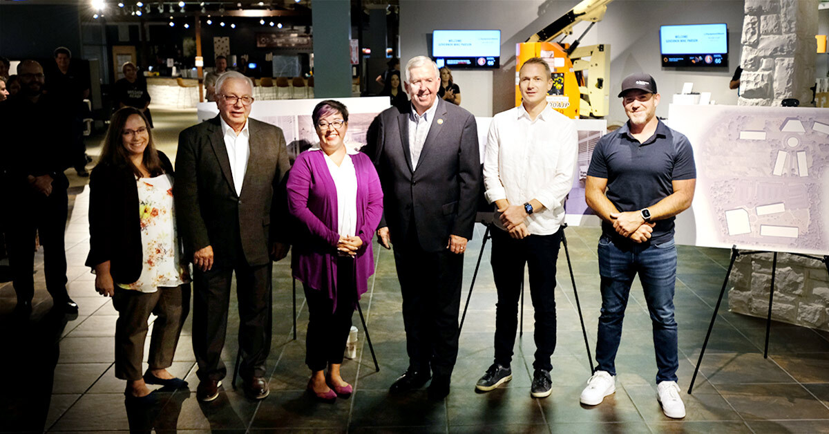 Image of Missouri Gov. Mike Parson and other dignitaries at the announcement of EquipmentShare's expansion.
