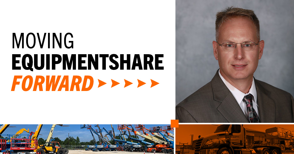 Photo of Kyle Jones along with vehicles from the ES fleet