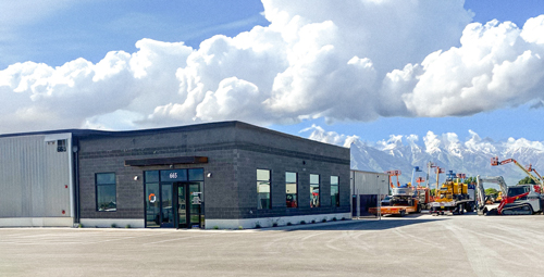 Picture of EquipmentShare location with large puffy clouds in the distance.