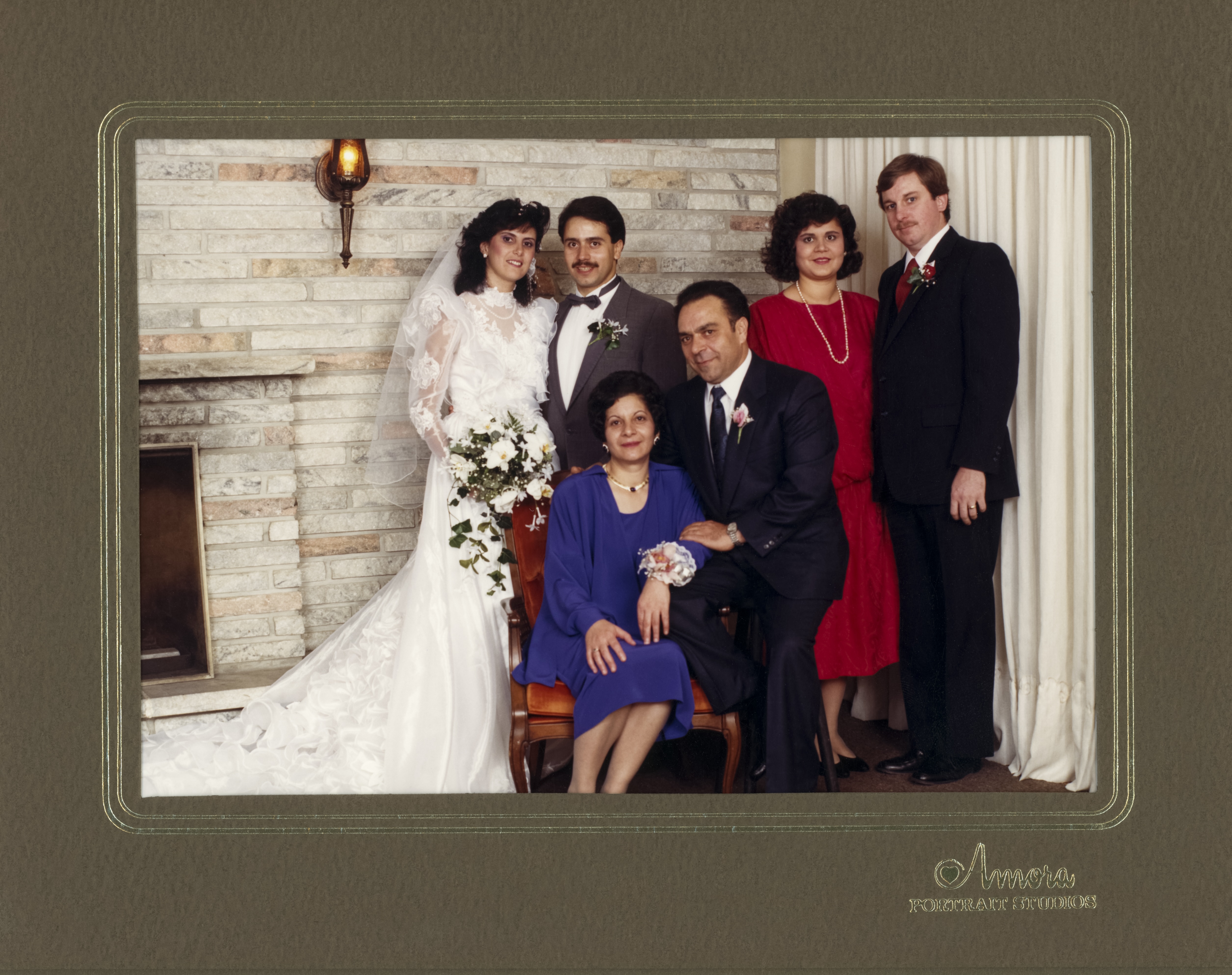 Helen with her husband and parents at her brother's wedding, 1986
