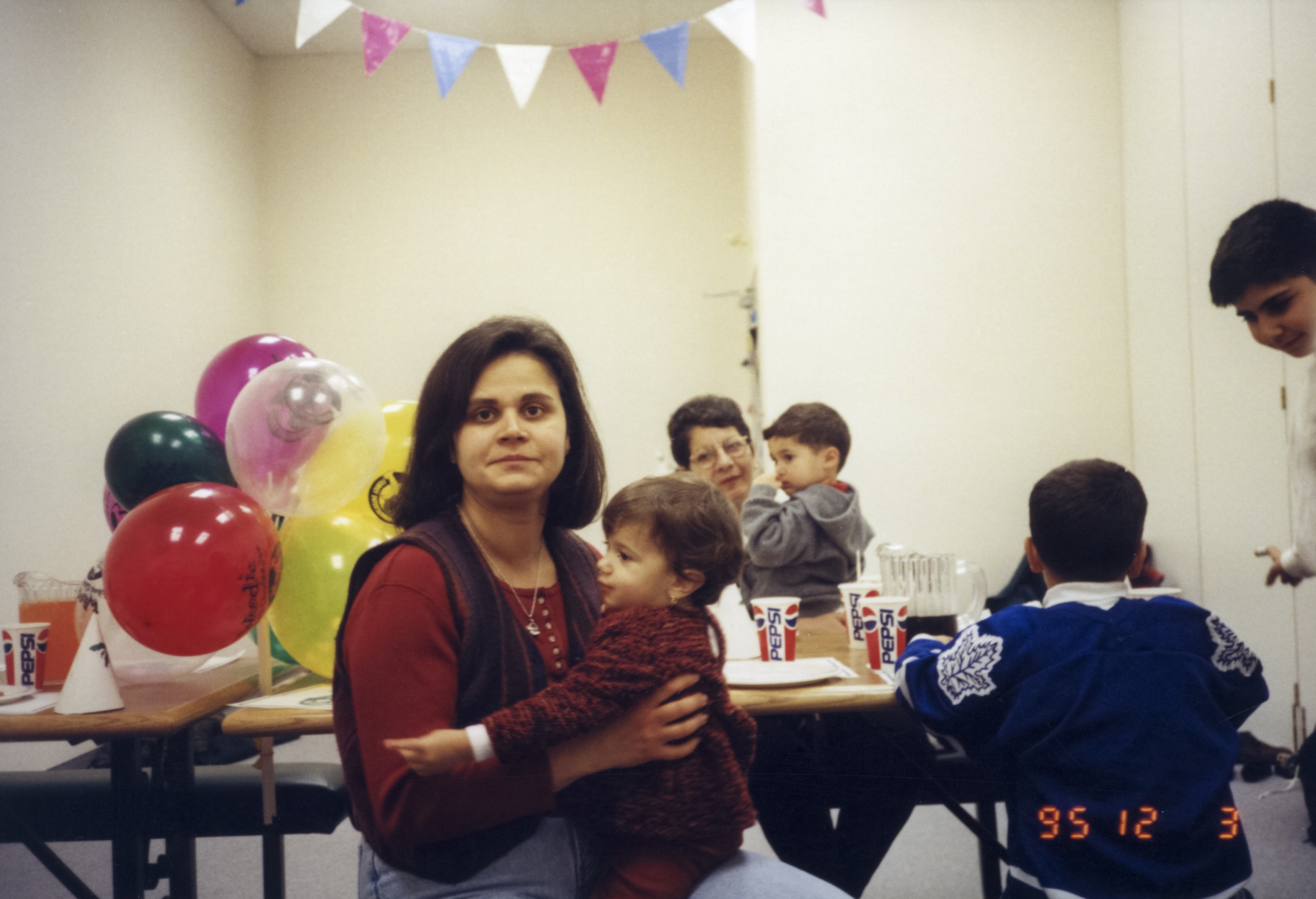 Helen with her niece at the interviewer's fourth birthday party, December 3, 1995