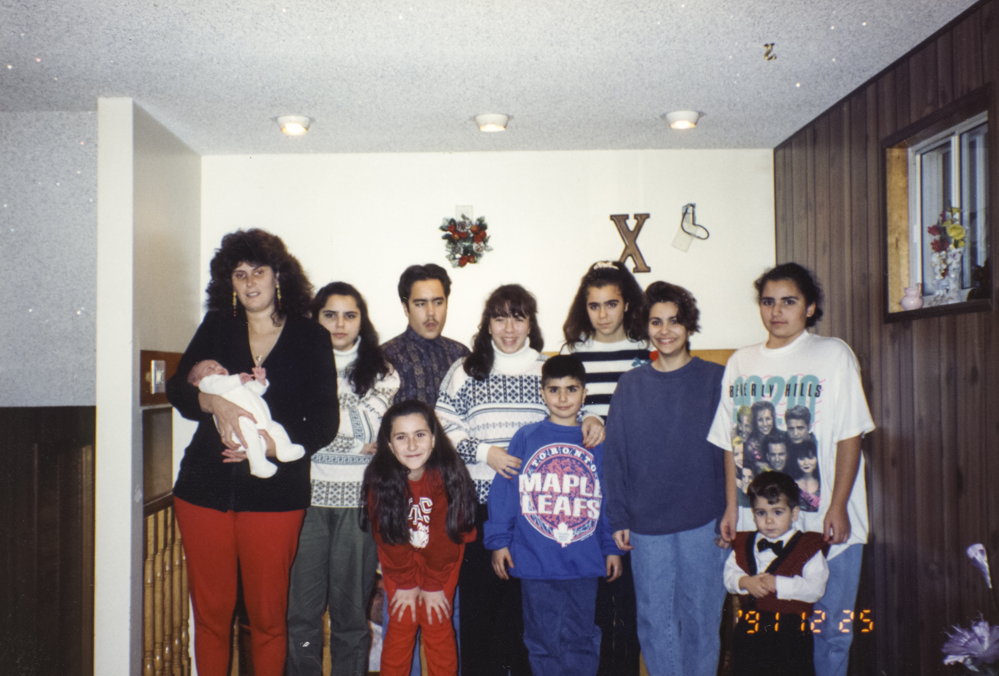 Helen (in the blue sweatshirt) with her cousins and siblings on Christmas Day, 1991