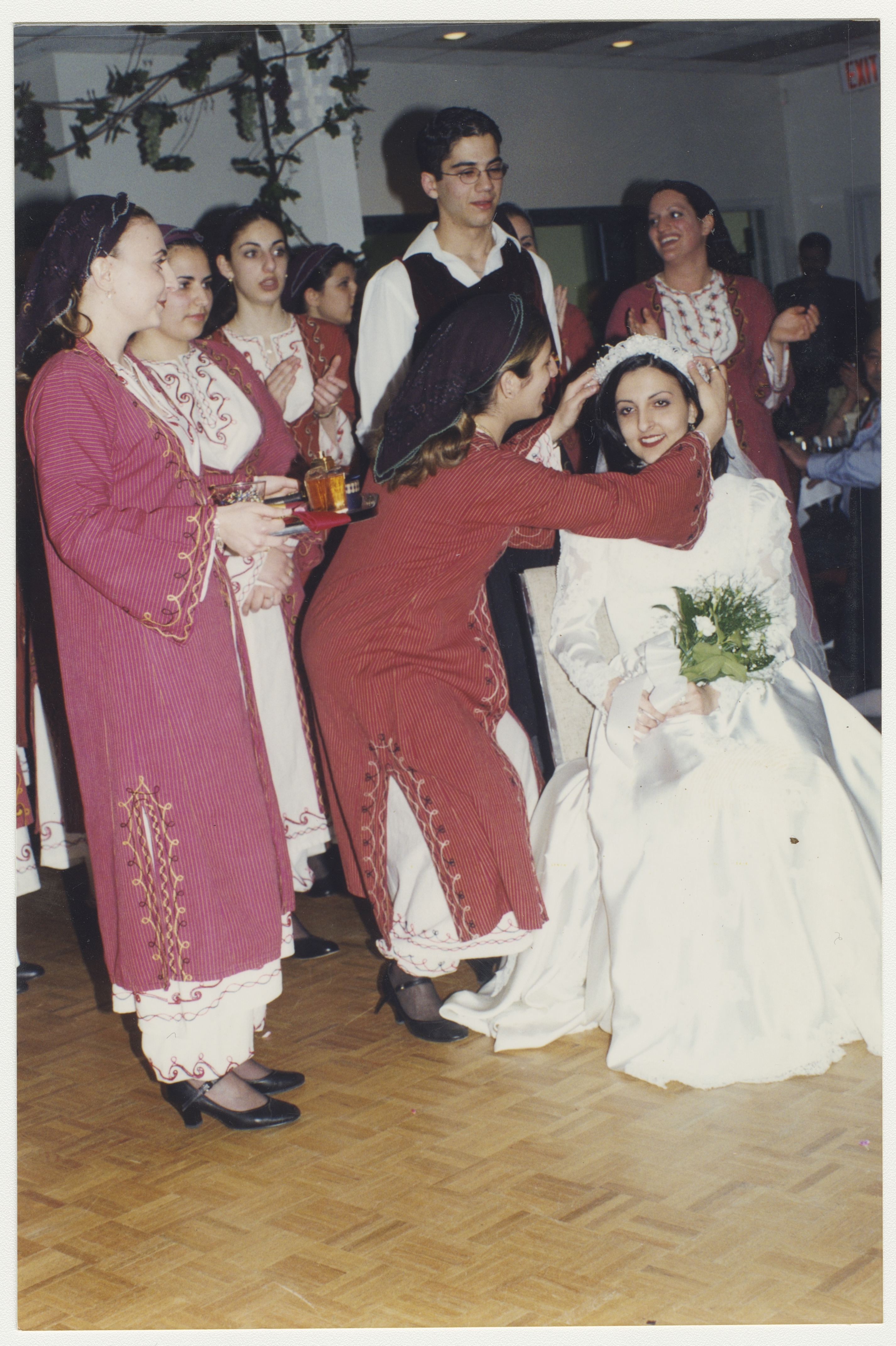 Helen's sister (in the background, toward the left)  in the Cypriot dance group, late 1990s. York University Libraries, ASC61633