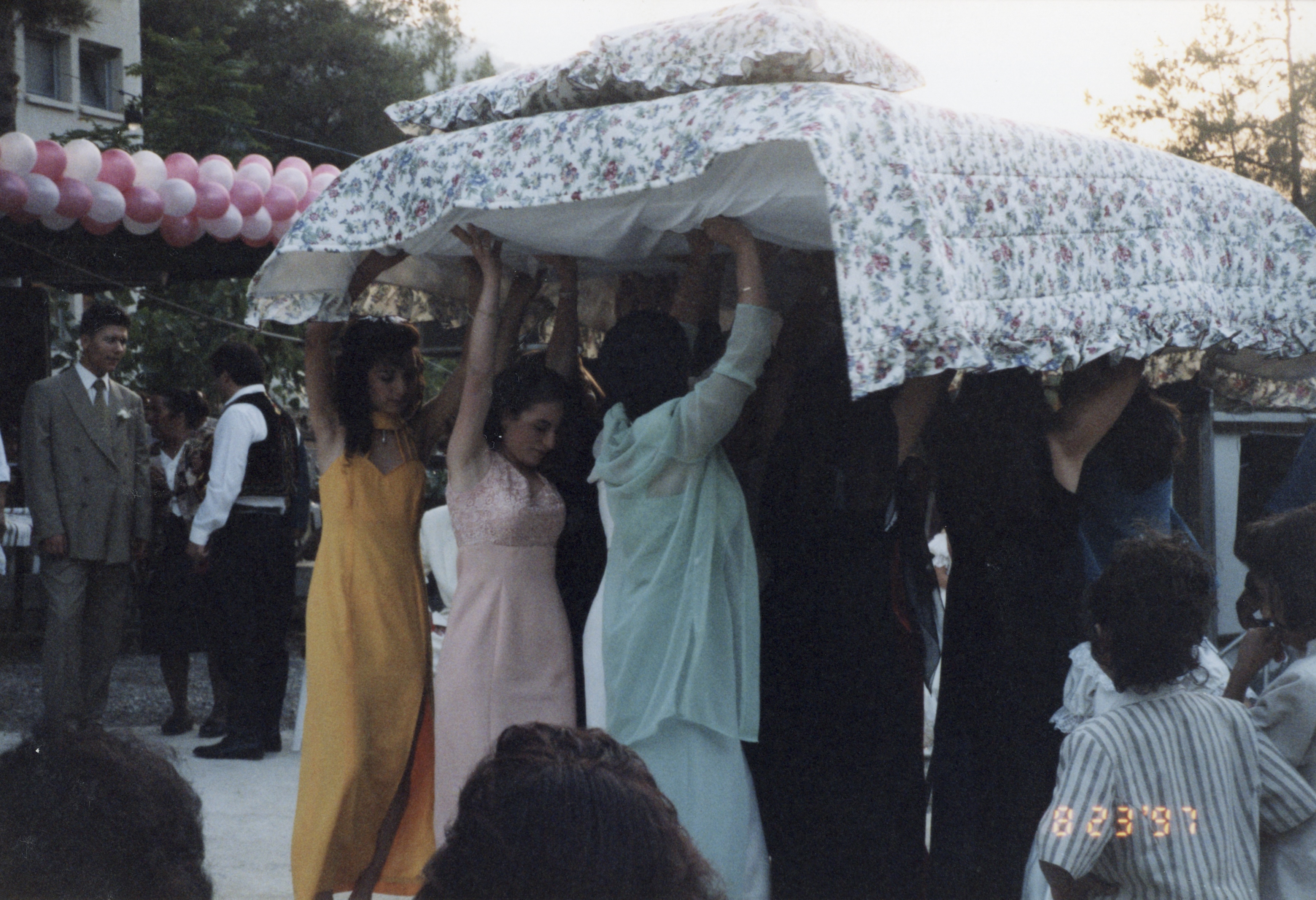 The traditional raising of the bed at Helen's cousin's wedding, August, 23, 1997