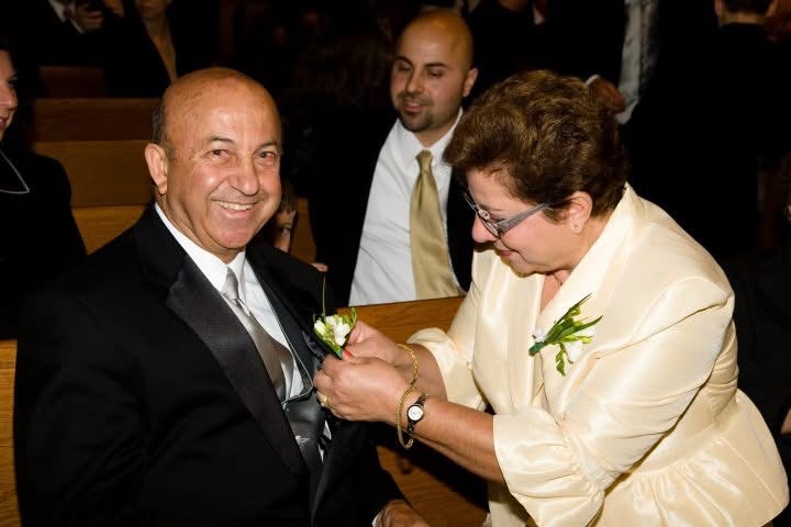 George with his wife and one of his sons at a wedding, 2010