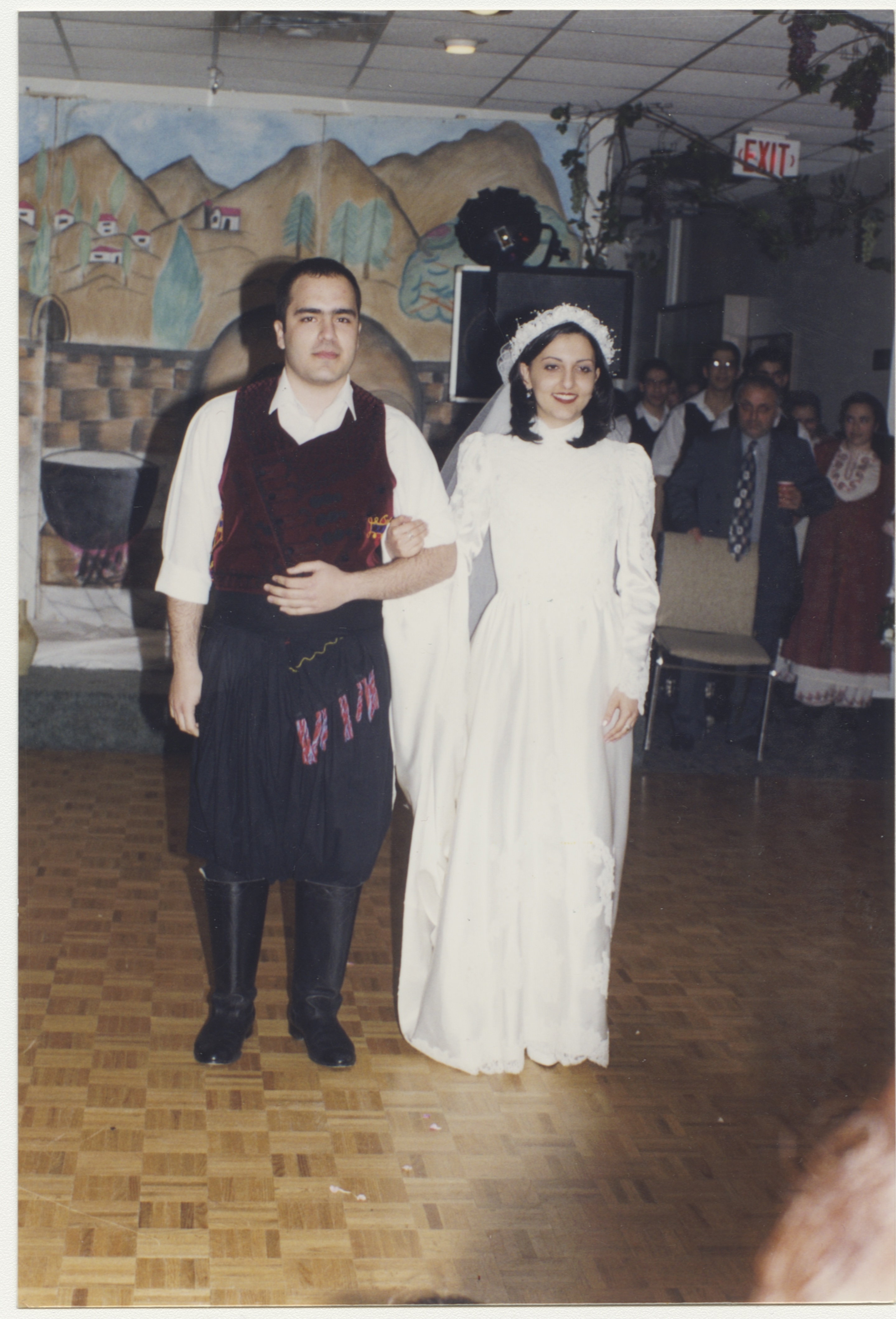 Anna's brother (with Anna in the background, toward the right) with the Cypriot dance group, late 1990s. York University Libraries, ASC61625