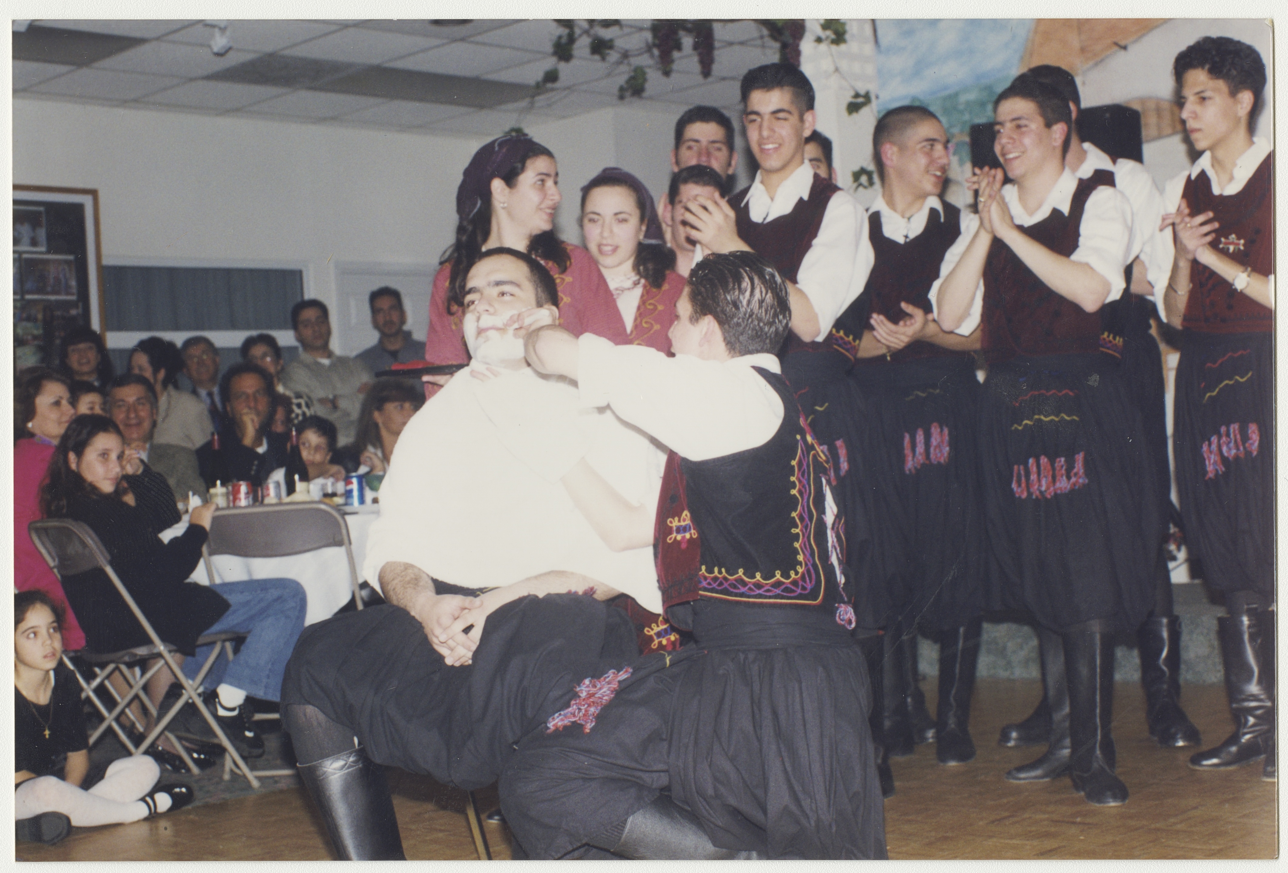 Anna (behind her brother) with the Cypriot dance group, late 1990s. York University Libraries, ASC61626