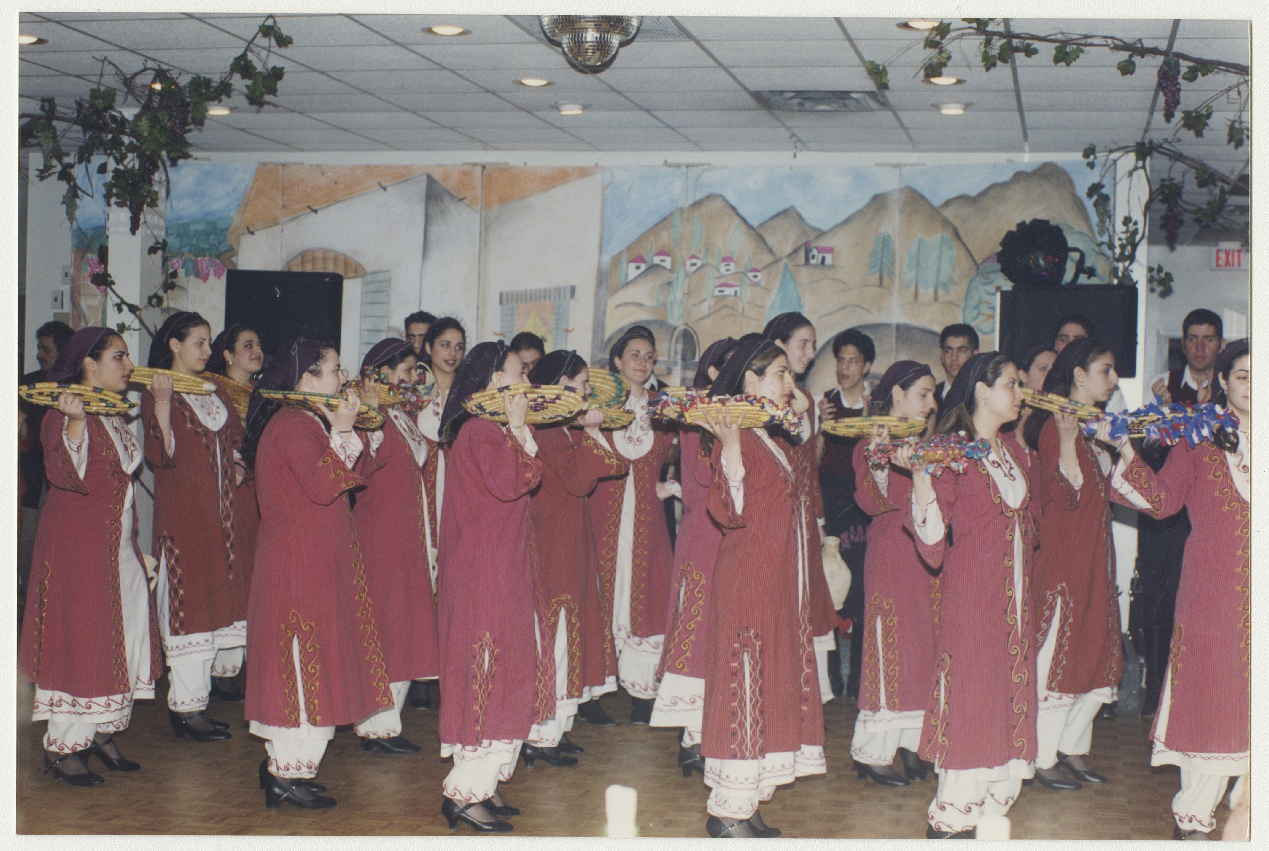 Anna (the second one on the left) in front of her cousin in the Cypriot dance group, late 1990s. York University Libraries, ASC61631