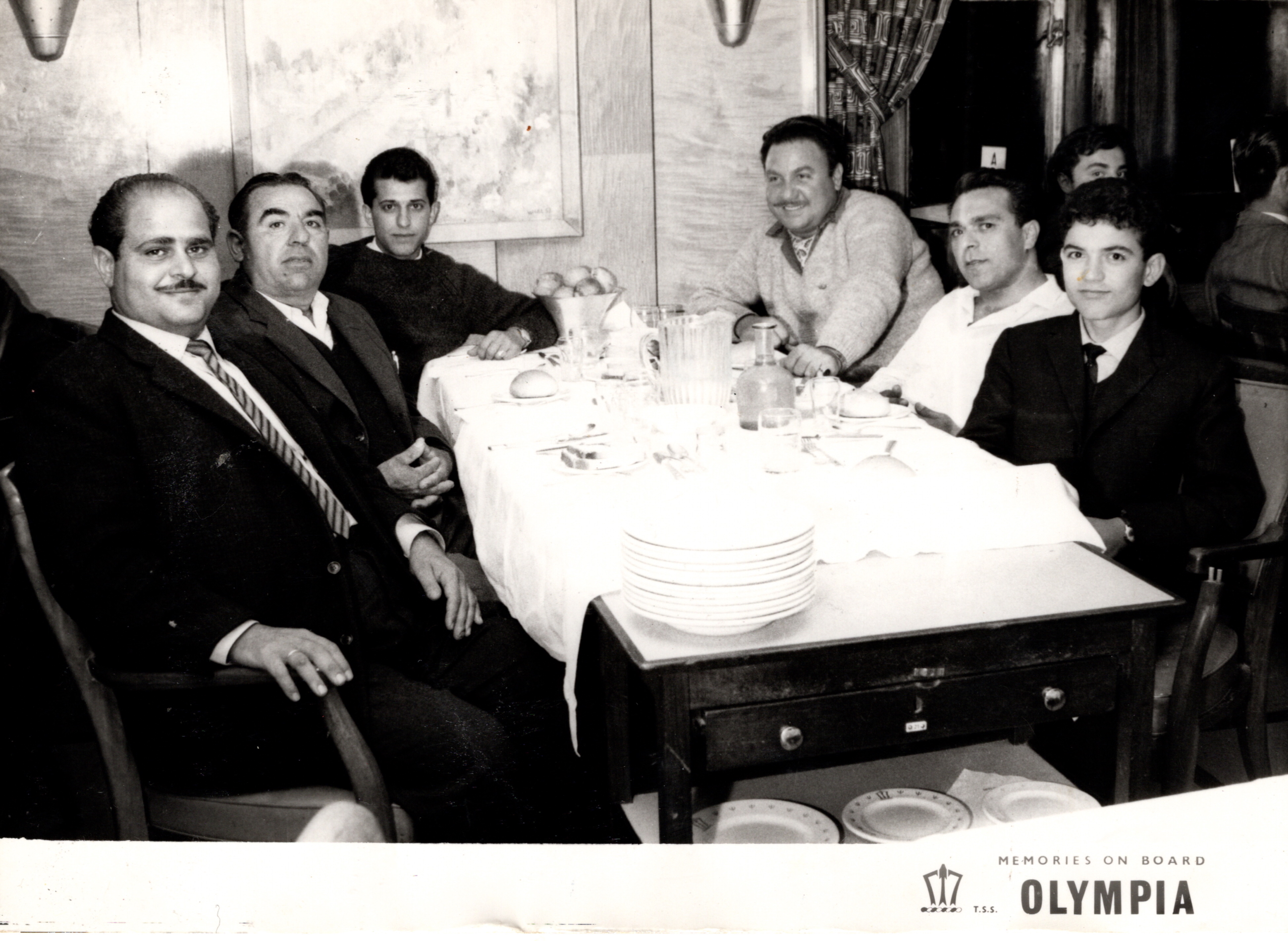 Theodoros (on the right, in the centre) with fellow migrants on the way to Canada, 1966