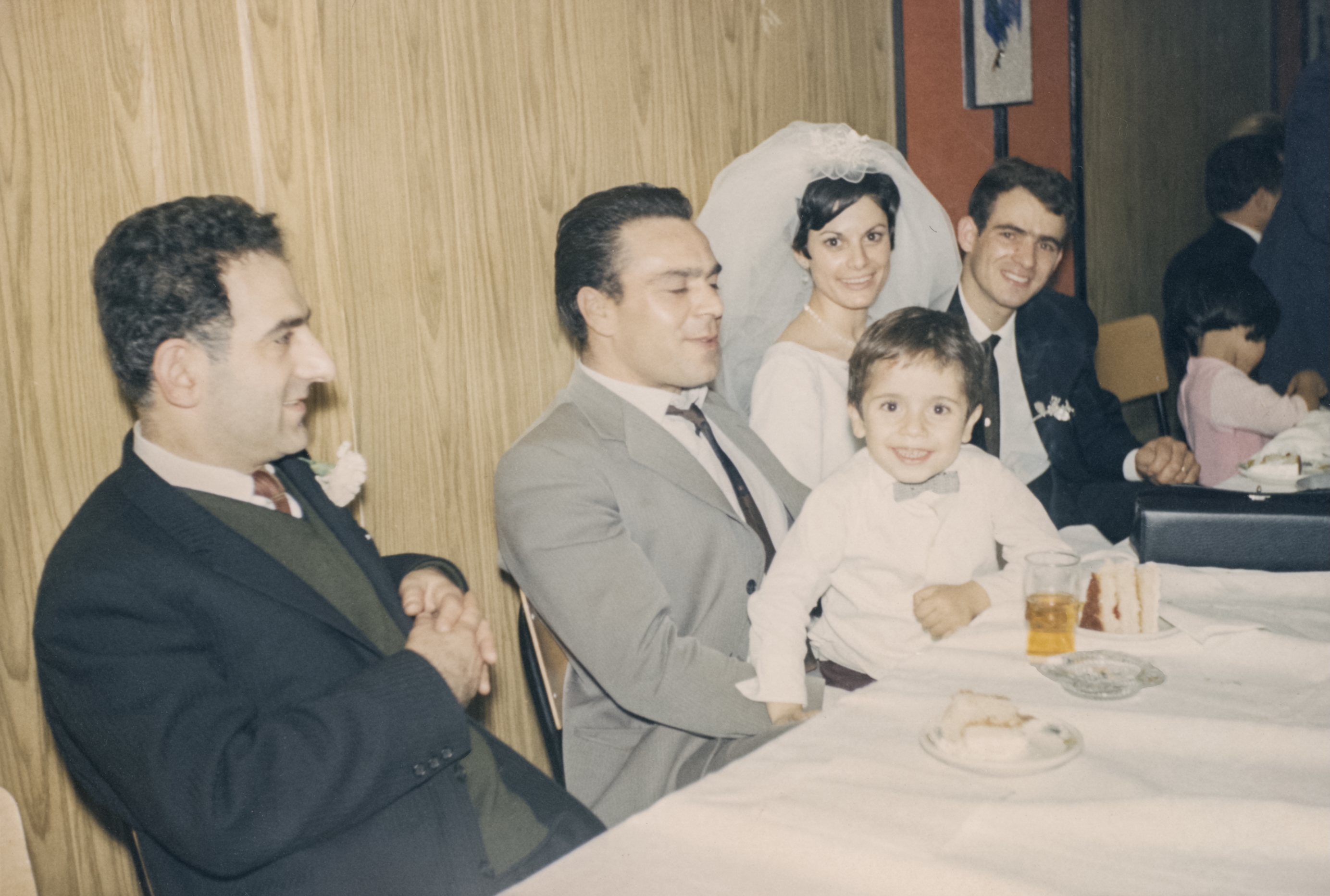 Theodoros with his son at a wedding, late 1960s or early 1970s