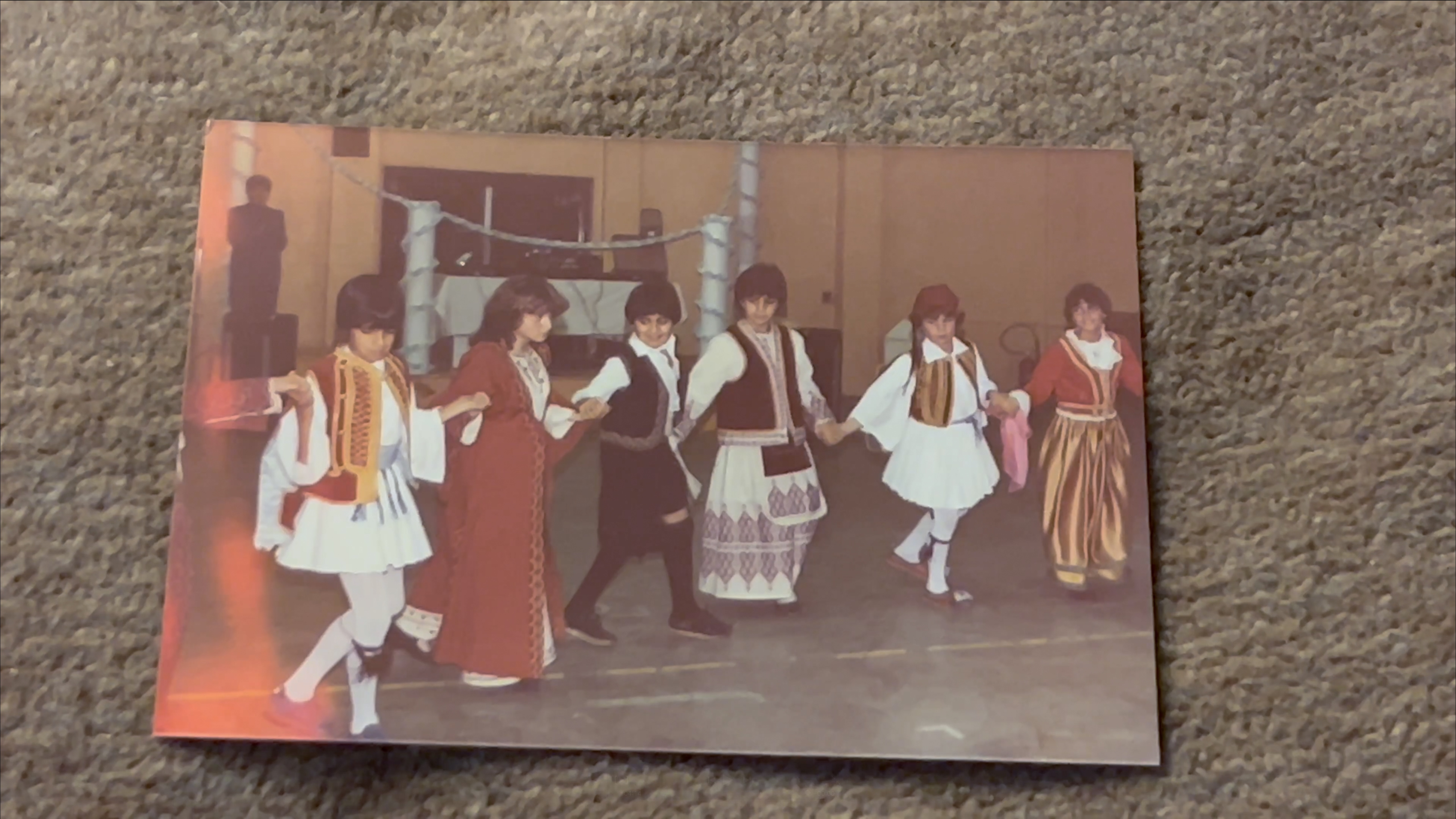 Androula's son (in the centre) participating in a dance recital, late 1970s or early 1980s. This was the first time he wore a vraka 