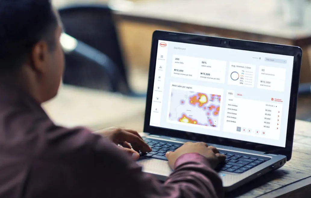 Man looking at dashboard UI