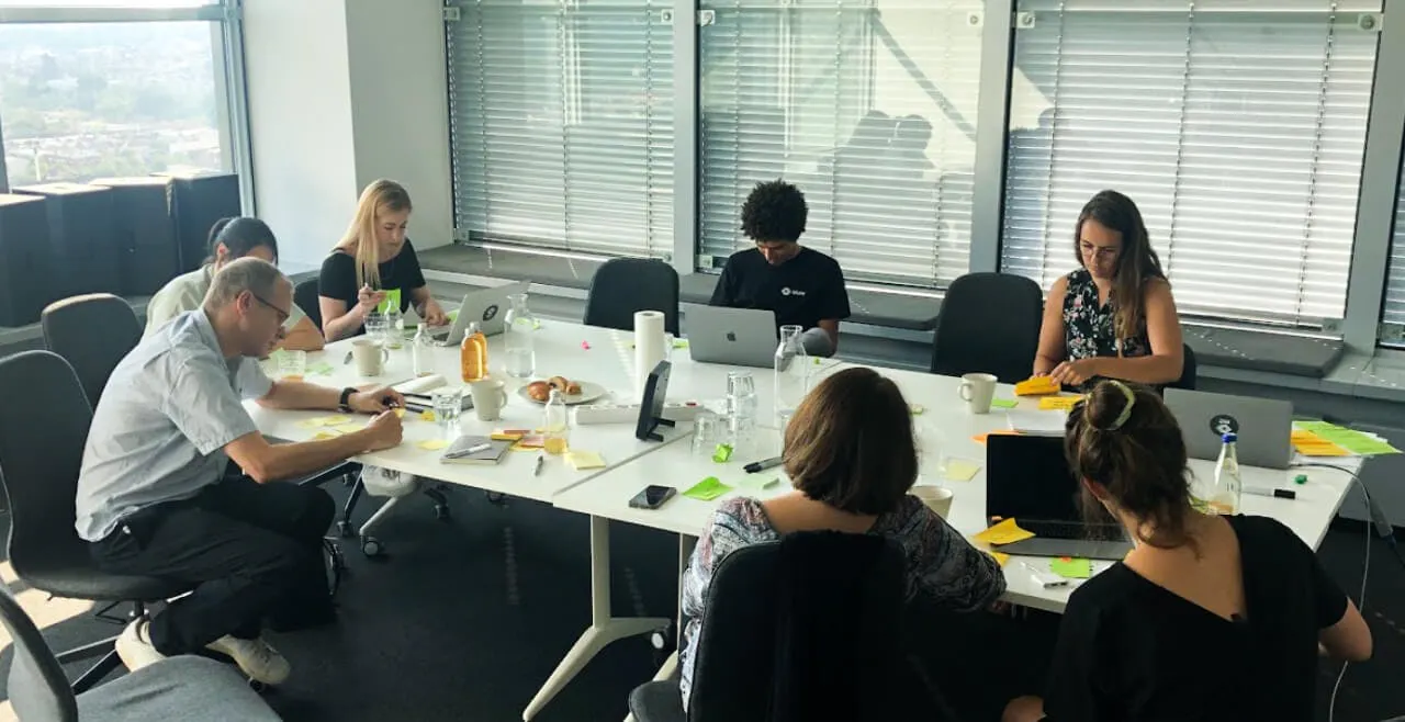 People sitting around desk