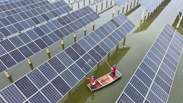 Maintenance work on a solar farm in eastern China. File pic: FeatureChina/AP