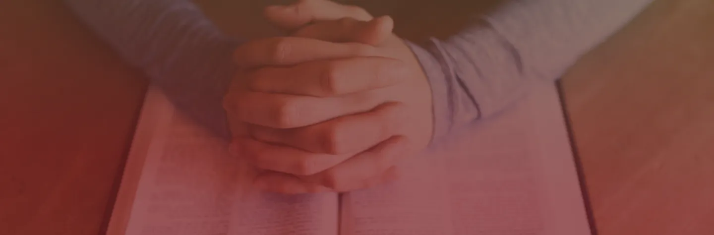 Hands clasped praying