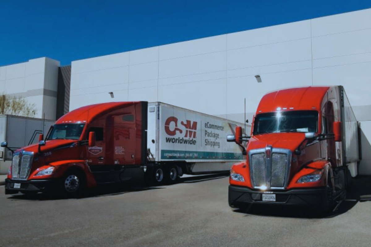 OSM HGVs at a warehouse.