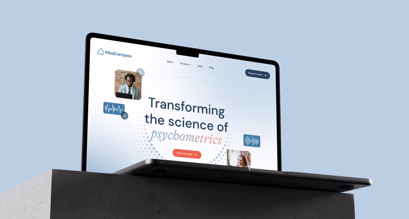 Laptop with MindCompass homepage.