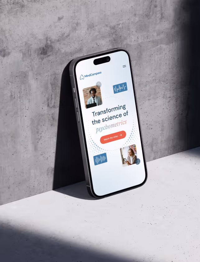 Smartphone with MindCompass homepage.