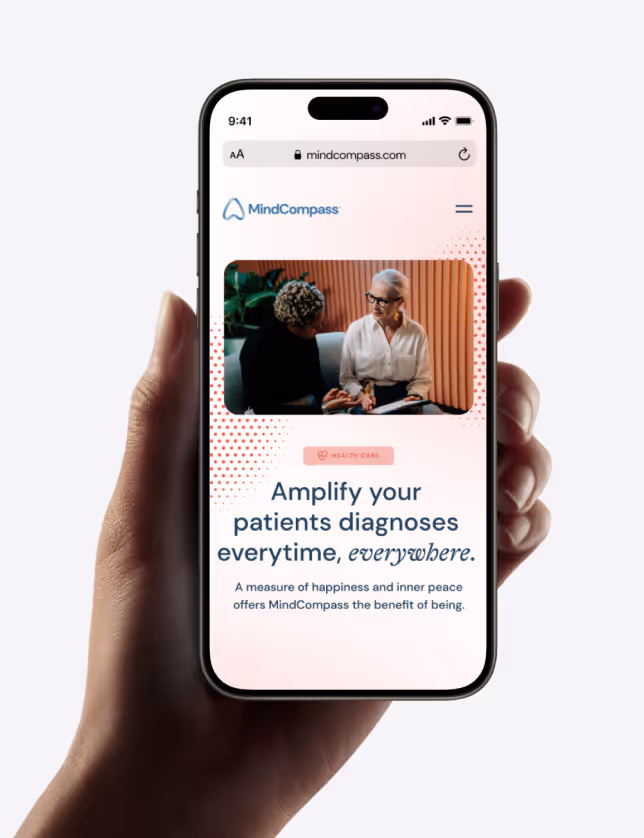 Smartphone with MindCompass website.